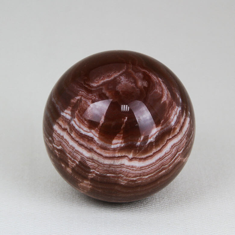 perfectly polished Red Aragonite sphere