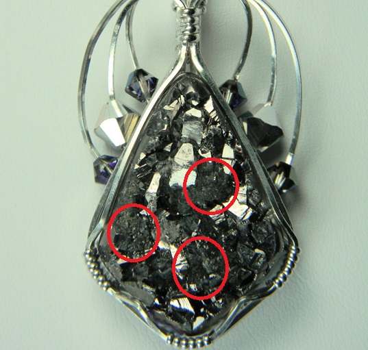 Damaged Pyrite pendant