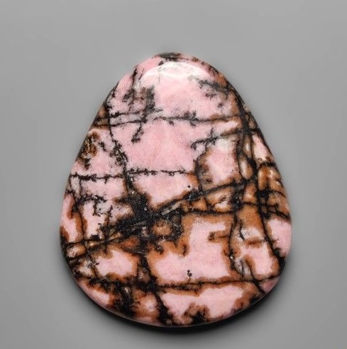 ugly rhodonite cabuchon